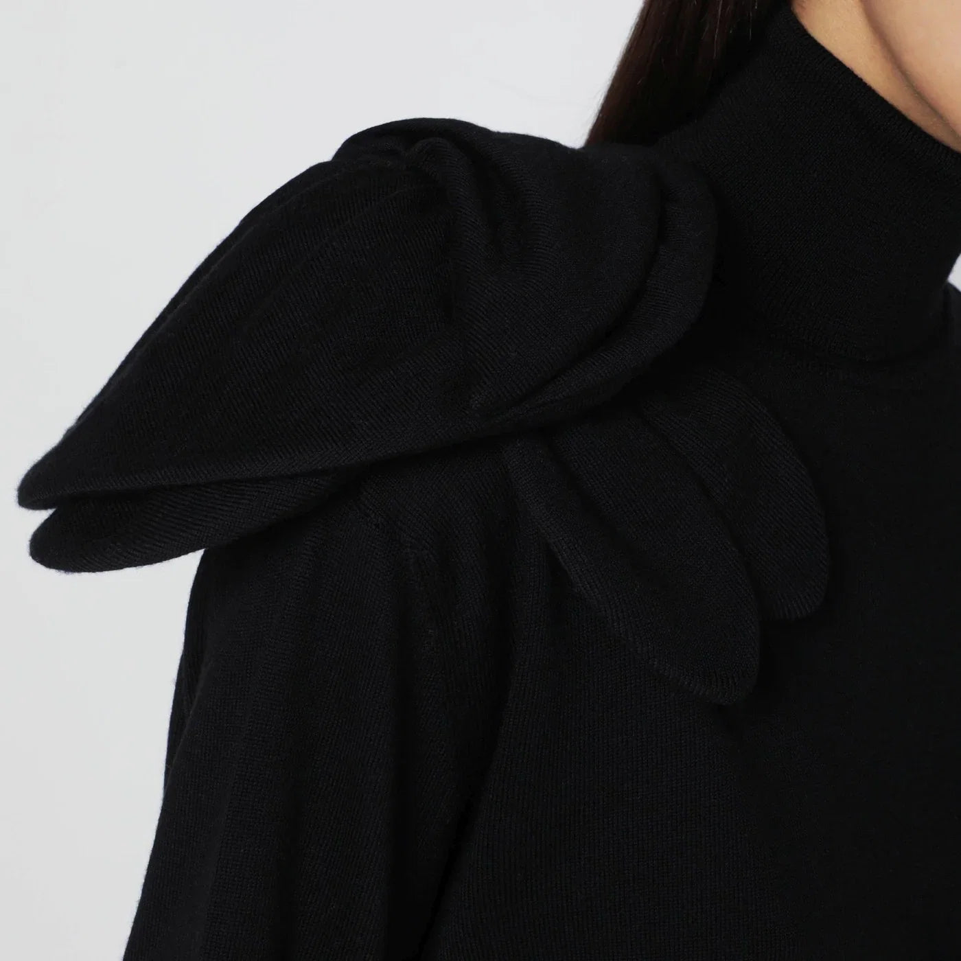 Moschino Black turtleneck sweater with flower detail
