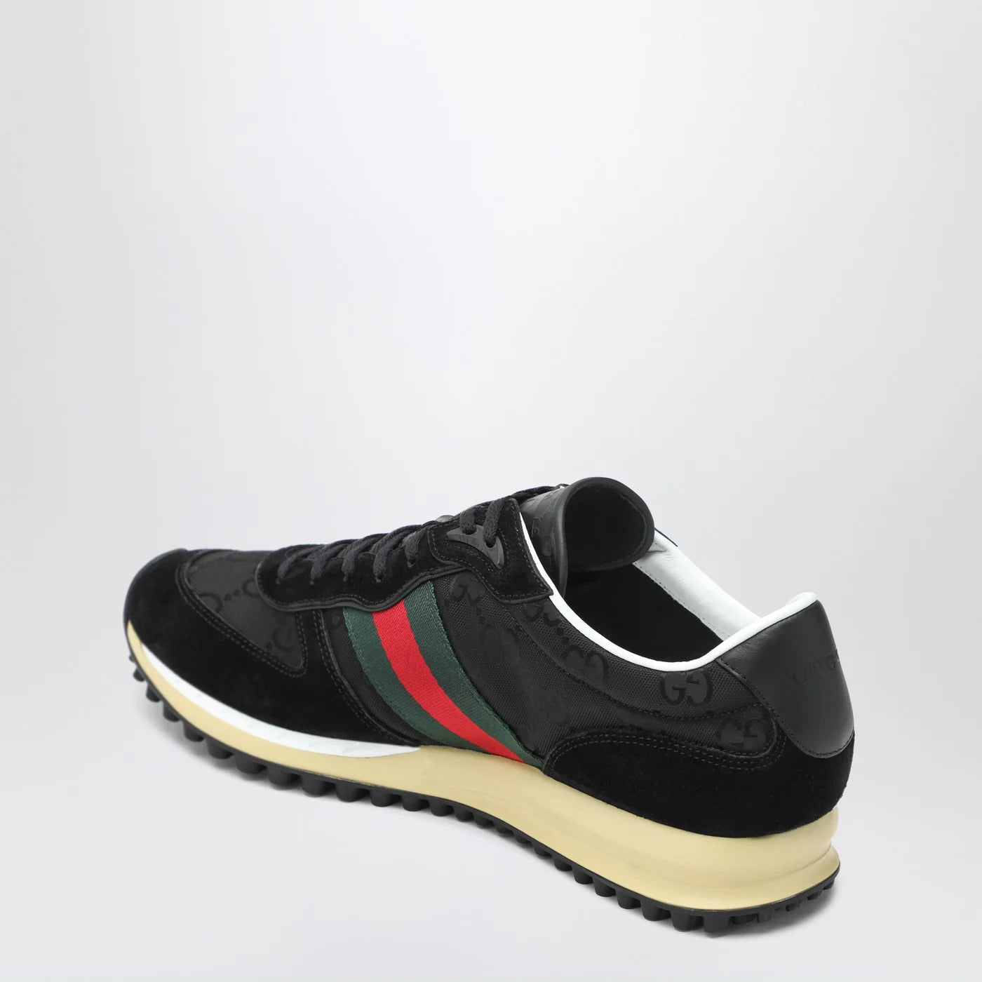 GUCCI Sneakers Re-Motion in black GG fabric