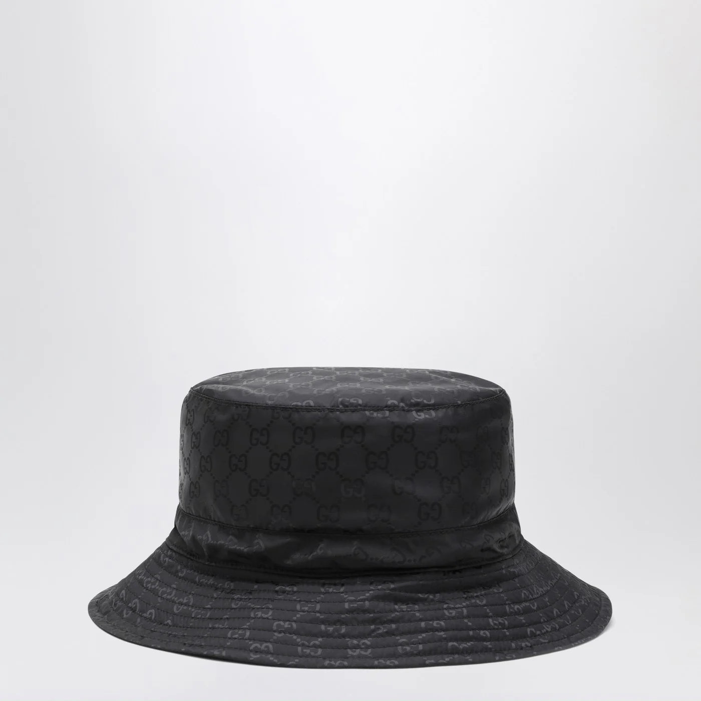 GUCCI Reversible black nylon GG hat