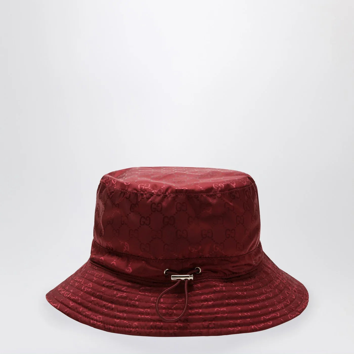 GUCCI Reversible burgundy nylon GG hat