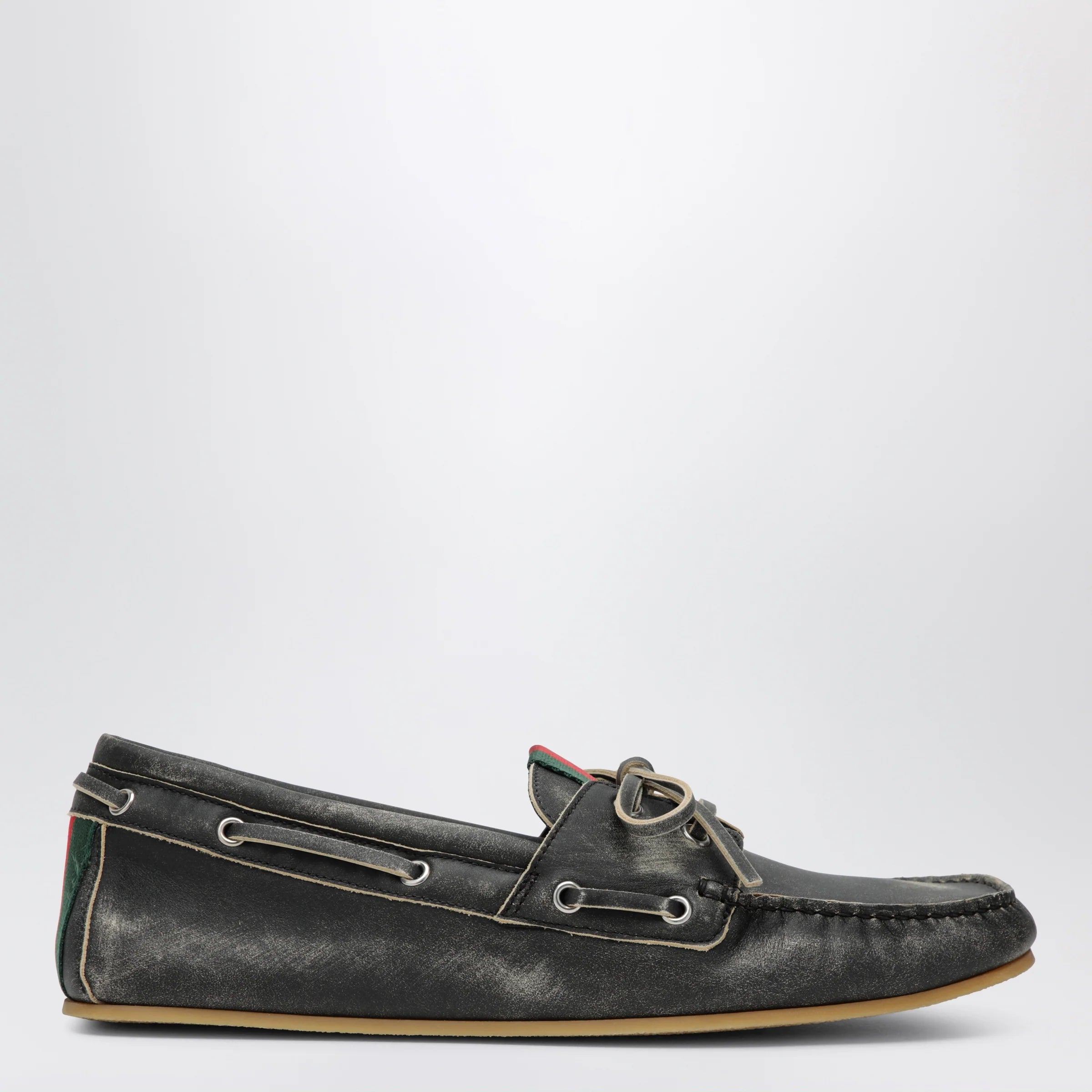 GUCCI Black boat shoes with washed effect