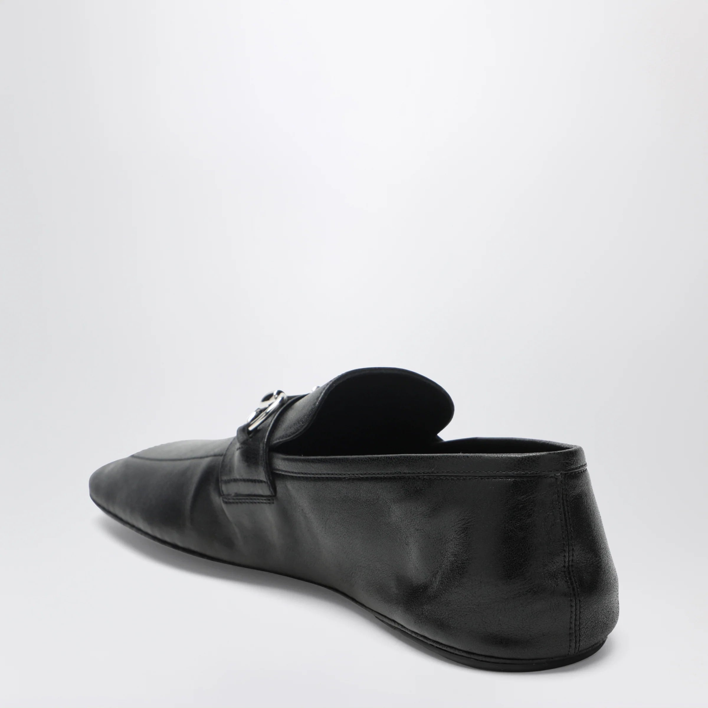 GUCCI Black leather horsebit loafers with silver hardware