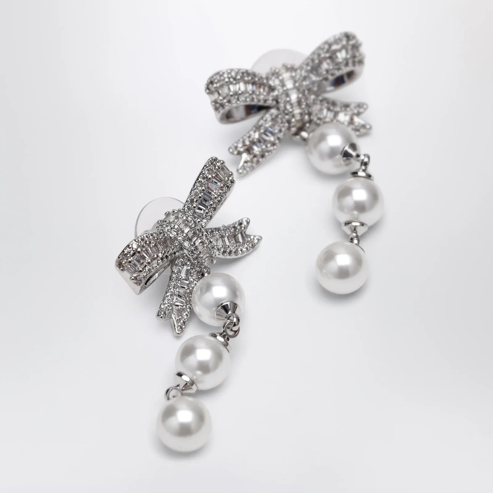 Self-Portrait Crystal bow and pearl drop earrings in silver
