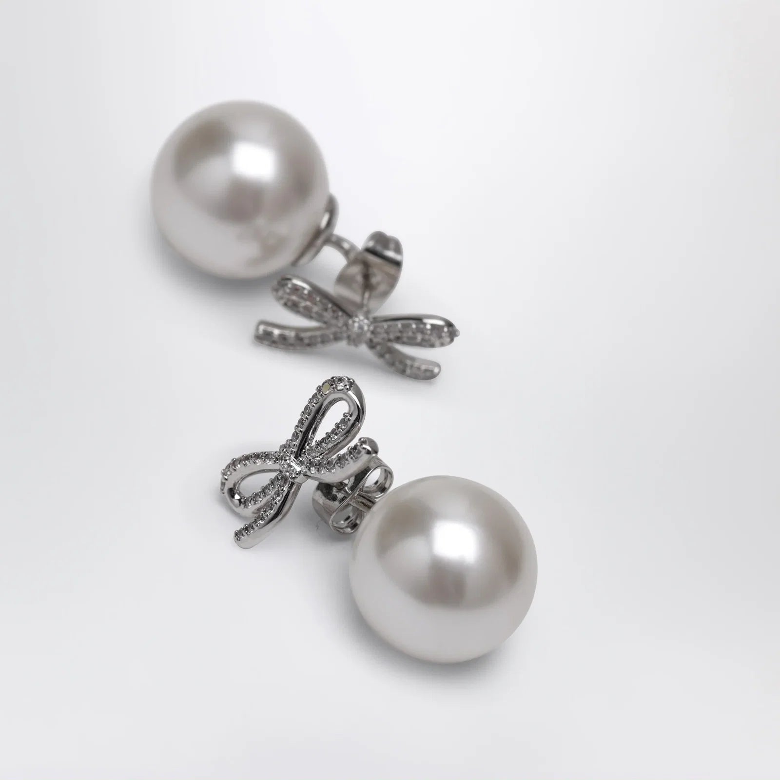 Self-Portrait SELF PORTRAIT Crystal bow and back pearl earrings in silver