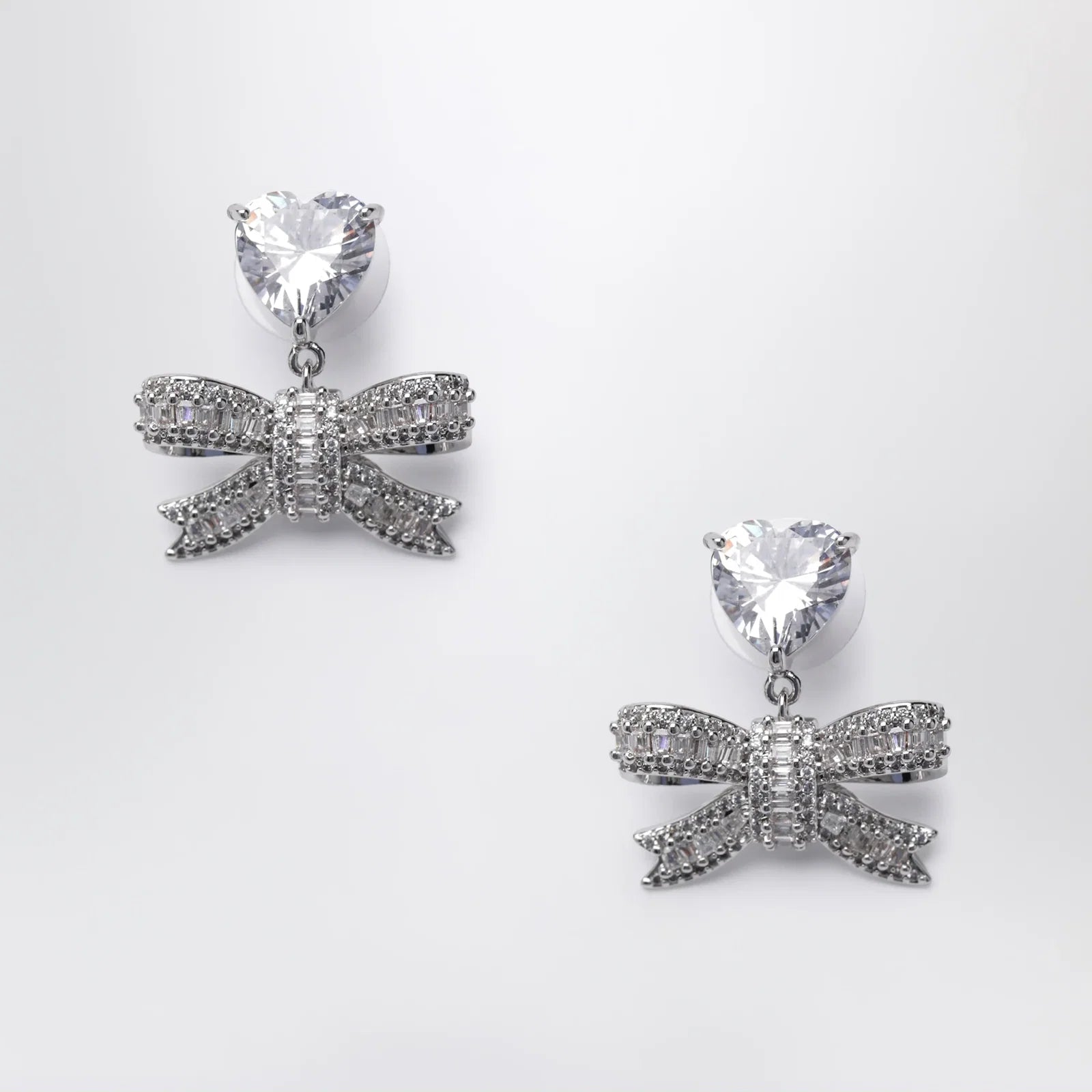 Self-Portrait SELF PORTRAIT Heart drop earrings with crystal bow in silver