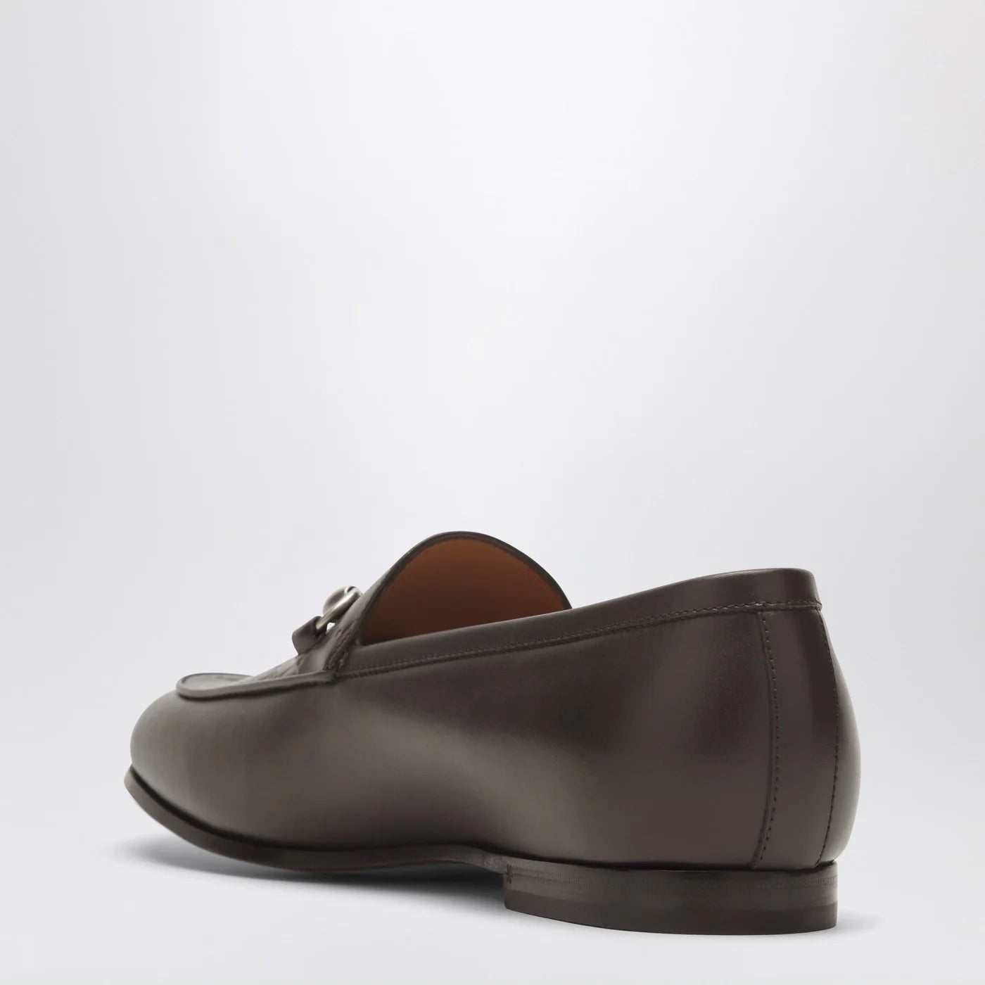 GUCCI Brown leather GG moccasin with a buckle