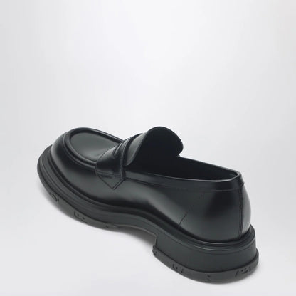 GUCCI Black leather loafer with logo