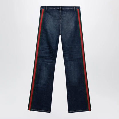 GUCCI Low-rise cotton denim Web tape trousers in blue