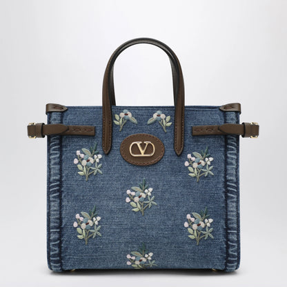 Valentino Garavani Antibes small embroidered denim shopping bag in blue