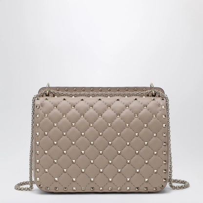 Valentino Garavani Medium Rockstud Spike bag in powder pink nappa leather