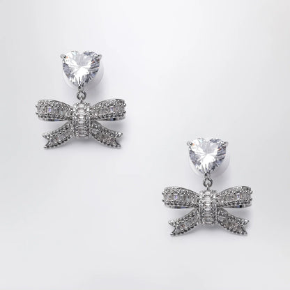 Self-Portrait SELF PORTRAIT Heart drop earrings with crystal bow in silver