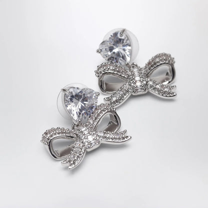 Self-Portrait SELF PORTRAIT Heart drop earrings with crystal bow in silver